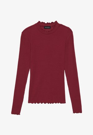 Long-sleeve burgundy top made of ribbed fabric, featuring a ruffled neck and hem, with fitted sleeves and a classic silhouette.