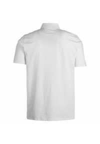 Polo shirt bianco a maniche corte con colletto a maglia piana e orlo dritto. Realizzato in morbido cotone, presenta una trama liscia.