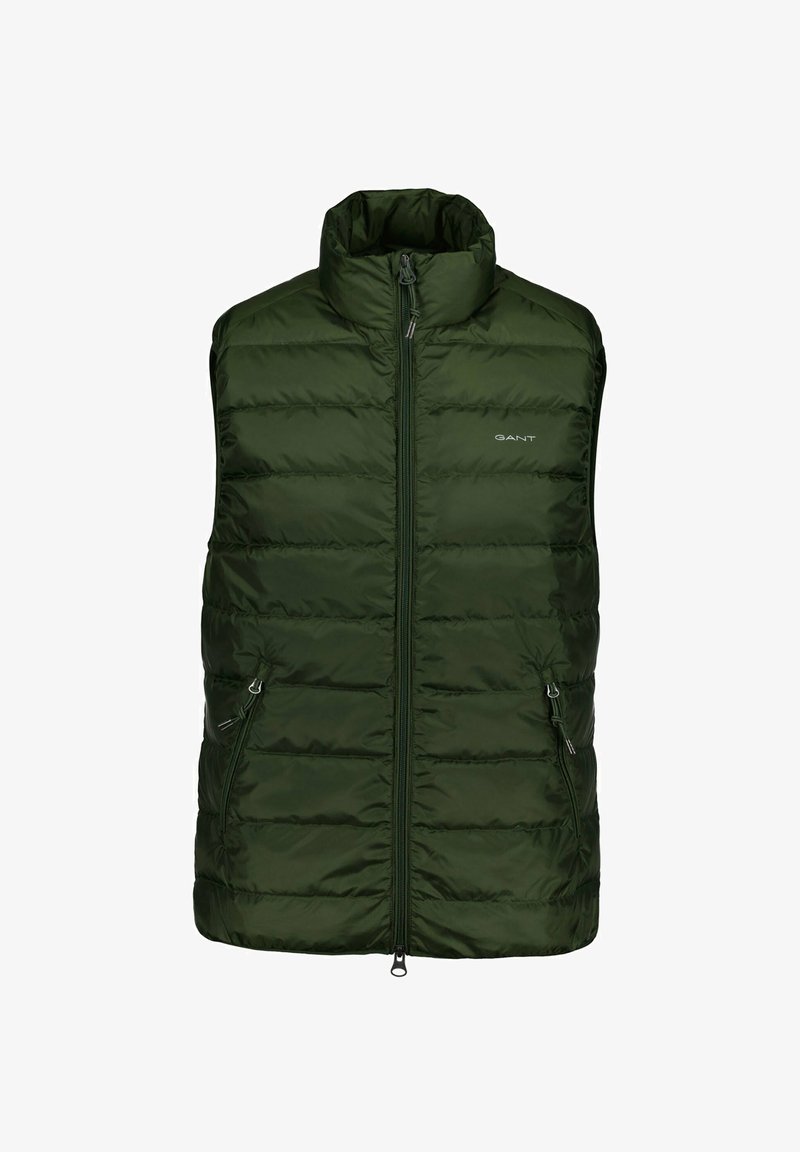 Grüne Steppweste mit hohem Kragen, Reißverschluss und zwei seitlichen Taschen. Verfügt über ein gesteppter Designs und das GANT-Logo auf der Vorderseite.