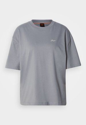 Gray short-sleeve t-shirt, loose-fit design, made of soft cotton, featuring a minimal logo in white on the chest, round neckline, smooth texture.