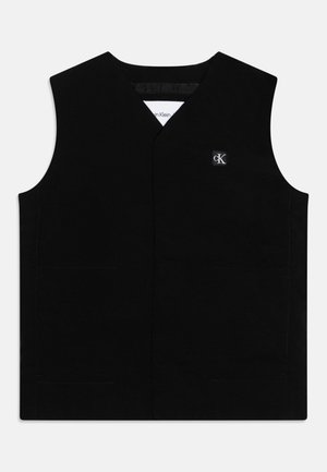 Gilet noir en coton avec un design en V, sans manches et deux poches avant. Il présente un petit logo brodé sur la poitrine.
