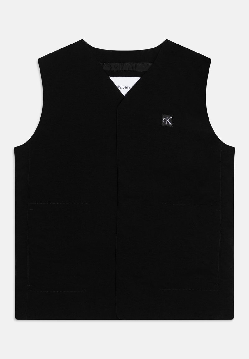 Gilet noir en coton avec un design en V, sans manches et deux poches avant. Il présente un petit logo brodé sur la poitrine.