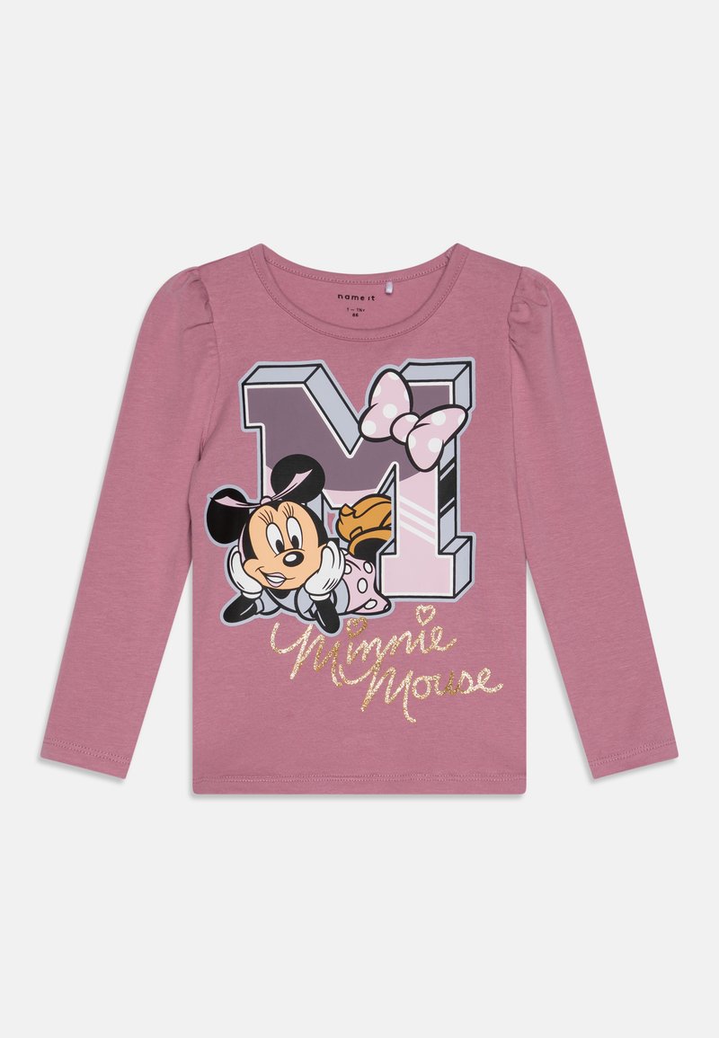 Långärmad rosa skjorta med puffärmar som har en grafik av Minnie Mouse och ett stort "M", prydd med glittrande text.