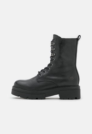 Stivaletti con plateau - black