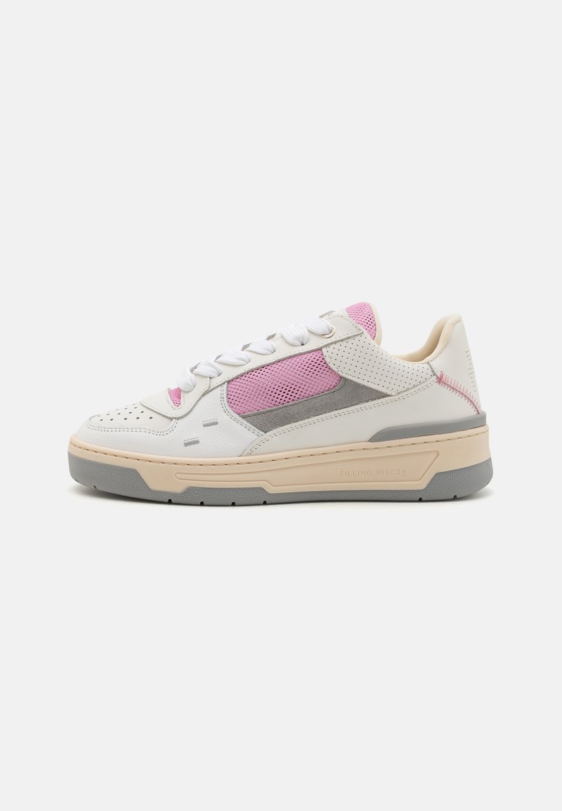 White sneaker with pink mesh panel, gray accents, and textured leather. Features white laces and a cushioned beige sole.