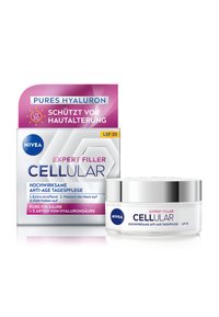 NIVEA Expert Filler Cellular anti-aging cream, white jar with a silver lid, alongside pink and silver box, labeled with hyaluronic acid benefits.