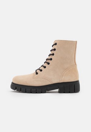 Bottines à plateau - beige
