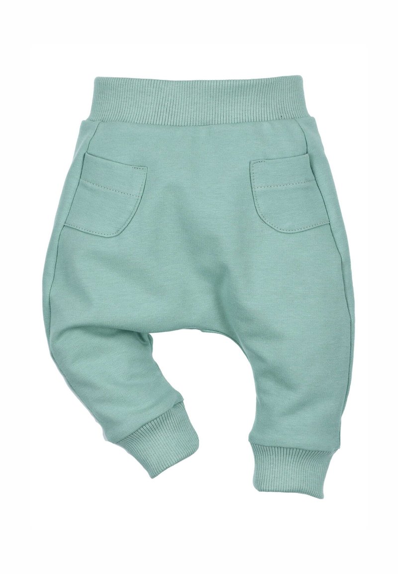 Lichtgroene joggingbroek van een katoenmix. Heeft een geribde tailleband, boorden en twee voorzakken met zichtbare stiksels.