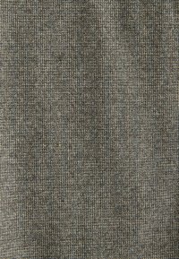 Gray textured fabric with a fine weave, featuring subtle dark and light threads creating a speckled pattern across the surface.