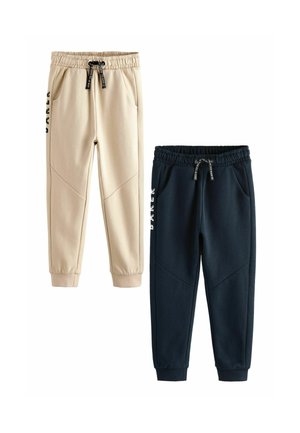 Deux paires de joggings : une beige, l'autre marine. Les deux possèdent des ceintures élastiques, des poches et des motifs de panneaux triangulaires distincts.