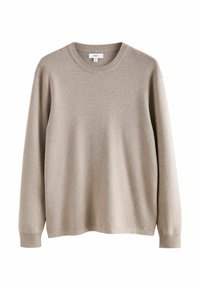 Beżowy sweter robiony na drutach z okrągłym dekoltem, długimi rękawami i ściągaczami. Miękka tekstura i luźny krój, bez wzorów czy dodatkowych elementów.