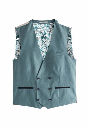 Teal väst med ett blommönstrat innerfoder. Har dubbelknäppta knappar, en bröstficka och svarta accenter på sidofickorna.