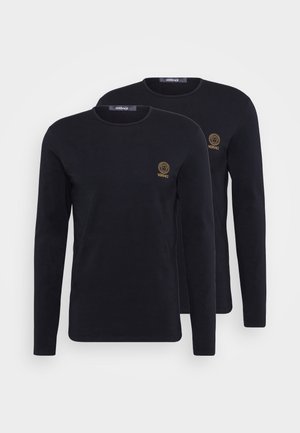 Black long-sleeve t-shirts made of cotton, featuring a round neckline and small embroidered gold logo on the chest. Two shirts shown.
