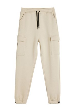 Pantaloni cargo beige realizzati in tessuto morbido, dotati di una cintura elastica, due tasche laterali e polsini arricciati con dettagli a coulisse.