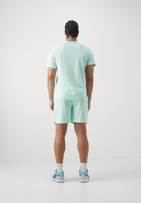 Jordan SHORT - Pantalón corto de deporte - mint foam/black