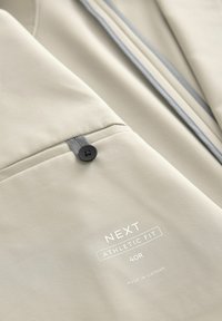 Next REGULAR FIT beżowy