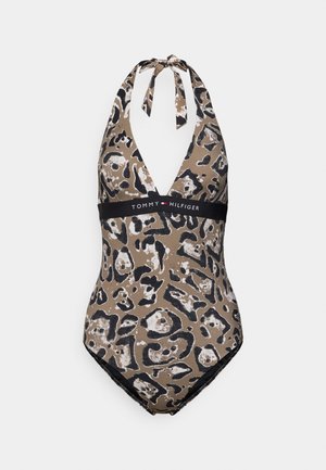 Jednodielne plavky s leopardím vzorom v odtieňoch hnedej a čiernej. Majú hlboký výstrih do V a šnúrky na zaväzovanie za krk. Čierny pás s logom značky v oblasti pása.