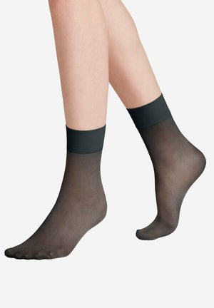 Black sheer ankle socks with a solid black cuff, semi-transparent material, and a smooth texture. Suitable for casual or formal wear.