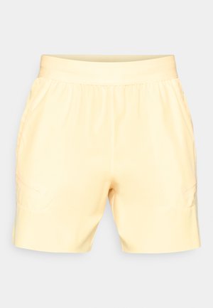 Κίτρινα, ελαφριά σορτς με ελαστική μέση, δύο πλαϊνές τσέπες και λεία υφή. Σύντομο μήκος με μινιμαλιστικό σχέδιο.