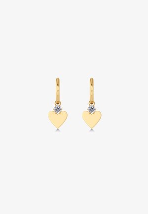 Boucles d'oreilles créoles en or avec des pendentifs en forme de cœur lisses suspendus et une pierre précieuse blanche ronde unique au-dessus de chaque cœur.