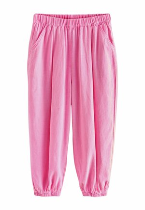 Růžové teplákové kalhoty z lněné směsi s elastickým pasem, bočními kapsami a elastickými manžetami u kotníků.