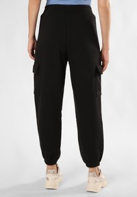 adidas Originals Treniņtērpa apakšdaļas - schwarz
