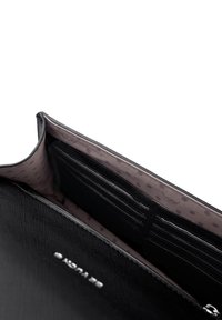 Black leather wallet open, showing multiple card slots and a zippered compartment inside with patterned fabric lining.