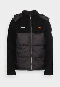 Schwarze Jacke mit einem strukturierten Fleece-Oberteil und einem glatten, isolierten Unterteil. Verfügt über einen Reißverschluss, eine Kapuze und gestickte Logo-Akzente.