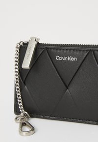 Calvin Klein ZIP AROUND CARDHOLDER - Wallet - black