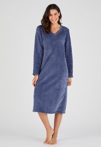 Camicia da notte a maniche lunghe, lunghezza al ginocchio, in morbido tessuto blu navy con un motivo ondulato testurizzato e scollatura a V. Senza elementi in metallo o accenti visibili.