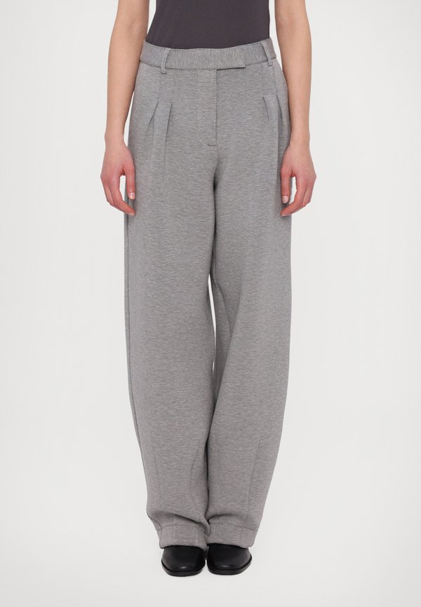 SOFT COCOON PANTS - Trousers