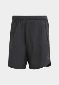 Shorts de sport noirs avec ceinture élastique, poches latérales et logo adidas sur la partie inférieure droite de la jambe.