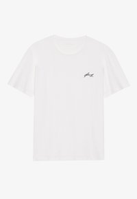 Hvit bomulls T-skjorte med korte ermer, rund hals, og en liten svart signatur-logo trykket på venstre brystområde.