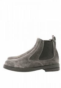 Stivali alla caviglia in suede grigio con pannelli laterali elasticizzati, linguetta di trazione e suola piatta. Texture liscia con una leggera lucentezza, caratterizzati da un design con punta arrotondata.