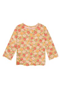 Langarm bloesemshirt van zachte stof. Gekleed met oranje, roze en gele bloemen op een lichtroze achtergrond en een ronde halslijn.