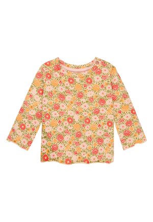 Langarm bloesemshirt van zachte stof. Gekleed met oranje, roze en gele bloemen op een lichtroze achtergrond en een ronde halslijn.