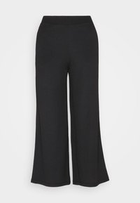 Pantalon à jambes larges en noir, fabriqué en tissu texturé, avec une taille haute et des coutures nettes pour une coupe décontractée.