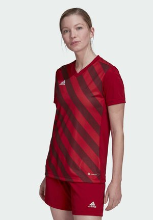 Rotes Sporttrikot mit V-Ausschnitt, kurzen Ärmeln und diagonalen Streifen in dunklerem Rot. Verfügt über das adidas-Logo auf der linken Brust und am Arm.