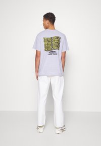 Weekday GALAXY LOOSE STRAIGHT UNISEX - Calças de ganga folgadas - white