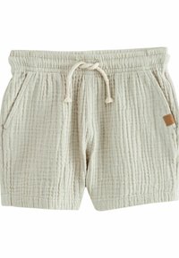 Shorts beige clair en tissu texturé avec des côtes visibles, dotés d'une taille élastique, d'un cordon de serrage et de poches latérales.