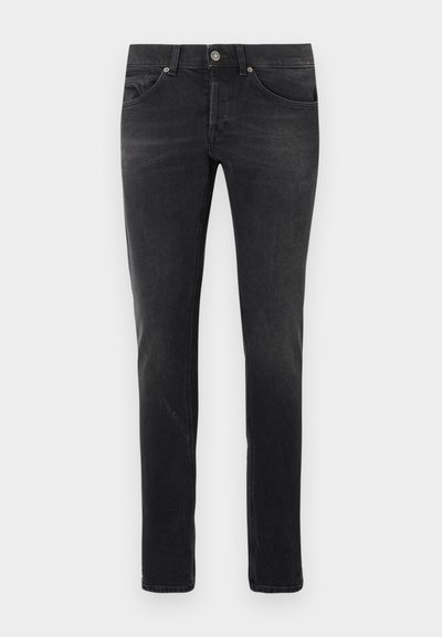 Μαύρο τζιν denim με στενή εφαρμογή, που διαθέτει δύο μπροστινές τσέπες, μια τσέπη για κέρματα και μία πίσω τσέπη. Διακριτική ξεθωριασμένη υφή.