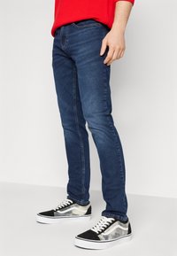 Tommy Jeans AUSTIN SLIM - Blugi slim fit - denim dark