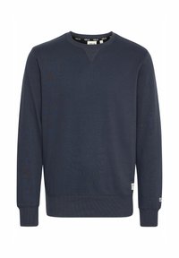 Dunkelblauer Sweatshirt aus weichem Stoff, mit Rundhalsausschnitt, langen Ärmeln, gerippten Bündchen und einem kleinen Markenetikett am unteren Saum.