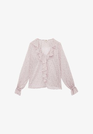 Lys pink blouse lavet af gennemsigtig stof, med en flæset halsudskæring, lange ærmer med puffede manchetter og spredte mørke polka dots.