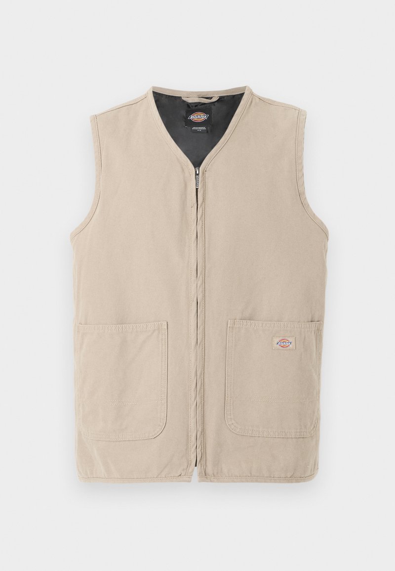 Chaleco de trabajo sin mangas beige con cremallera frontal, dos grandes bolsillos delanteros y forro interior negro.