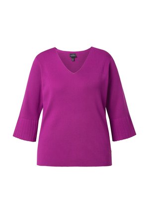 Lilla striktrøje med V-hals, trekvartlange ribstrikkede ærmer og en afslappet pasform. Tekstureret mønster på ærmerne med sidestykke.