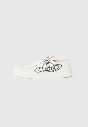 Canvas sneakers in off-white with a black planet graphic. Features white laces and a textured rubber sole. Rounded toe design.