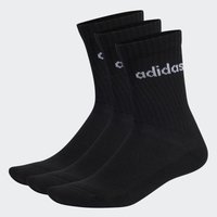 Calcetines negros de longitud crew fabricados de tejido acanalado, que presentan el logotipo blanco de "adidas" en el puño. Conjunto de tres pares. Textura suave.
