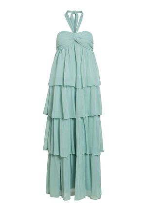 Varrukateta helesinine mitmekihiline maxi-kleit, millel on kaela ümber seotud pael ja kogutud ülakeha, voolav mitmekihiline seelik.