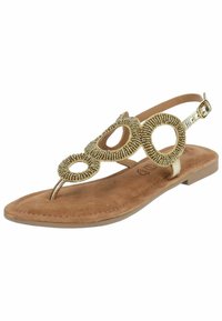 Sandali color oro con accenti di perline circolari, suola piatta, soletta simile alla suede e una fascetta regolabile sul tallone.